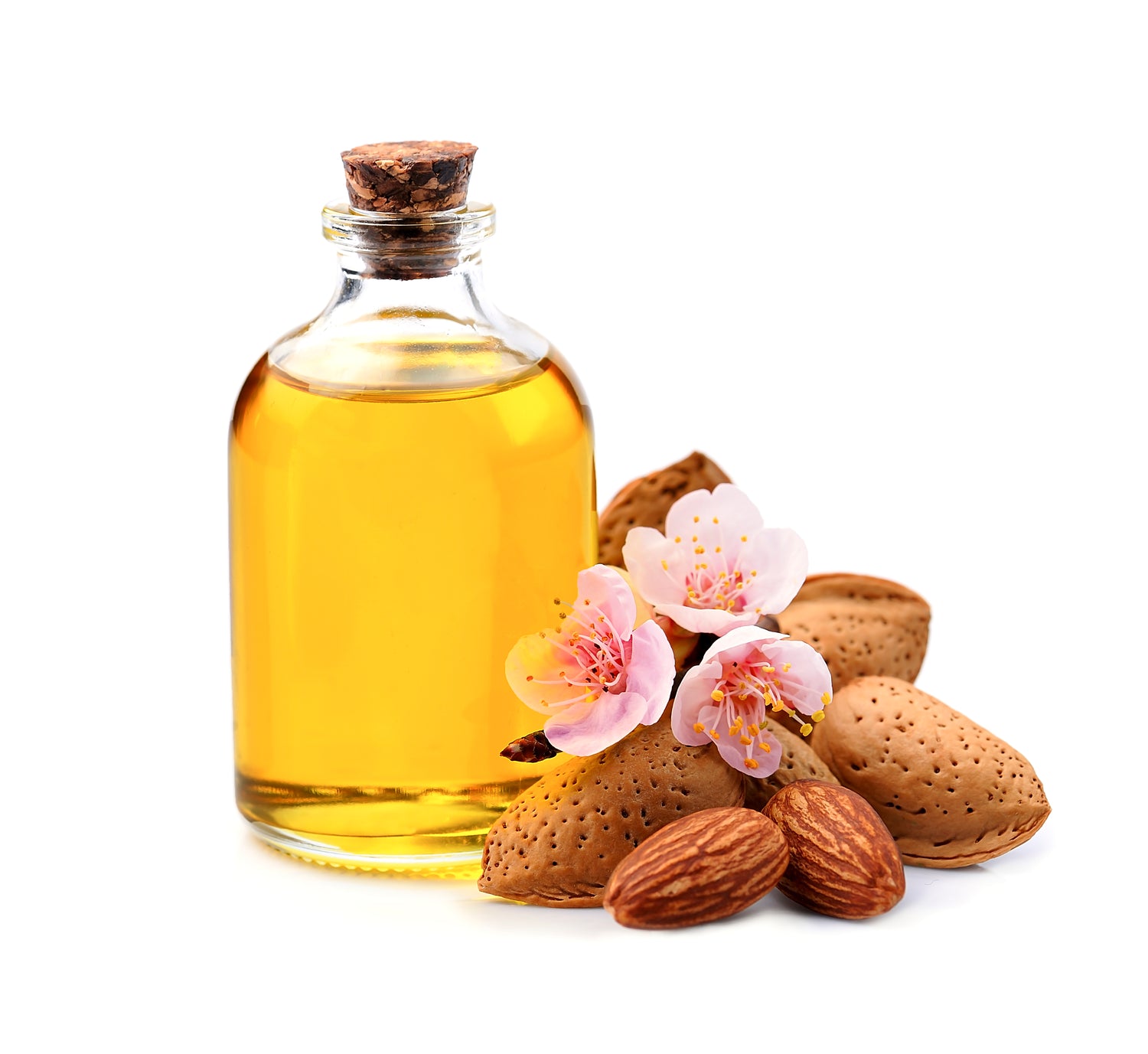 Almond Oil in a bottle with Almonds and Flowers